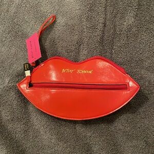 Betsy Johnson red lips-shaped “eyewear case”